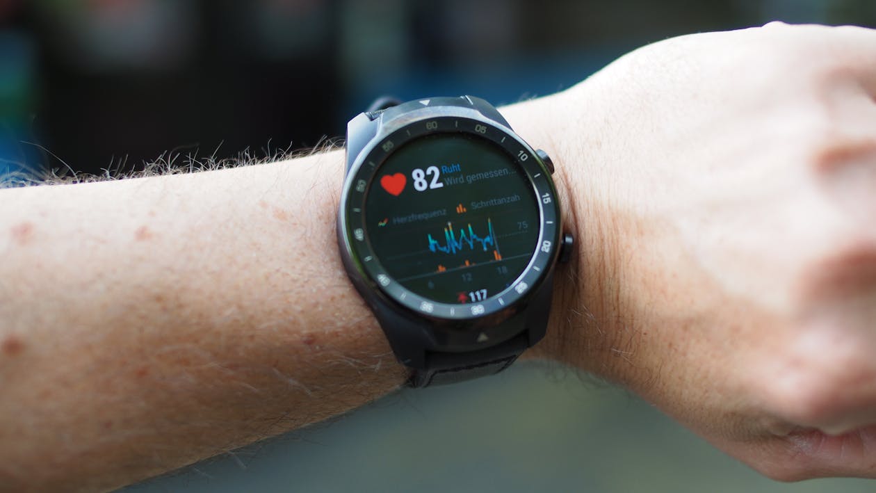 Person wearing heart rate monitor smartwatch